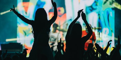 two-woman-in-the-crowd-at-a-music-festival-2022-06-29-07-50-38-utc.jpg